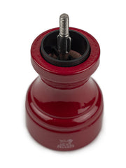 Peugeot | Bistro Pepper Mill in Passion Red, showcasing its classic design with visible central shaft and grinding burr, a timeless piece for culinary enthusiasts.
