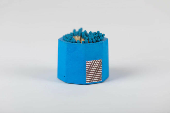 Tenn Prairie Match Holders with Striker, featuring a blue concrete holder with cork bottom, includes 70 blue matches and a side striker for easy lighting.