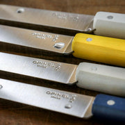 Opinel | Bon Appetit Steak Knives - Pepper with colored wood handles and stainless steel blades, showcasing the OPINEL inox stamp.