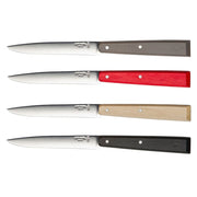 Opinel | Bon Appétit No.125 Steak & Table Knives Sets feature four knives with stainless-steel blades and colorful wooden handles, perfect for enhancing any dining experience.