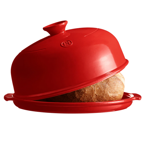 Emile Henry | Bread Cloche, Burgundy, showing a crusty loaf inside its domed ceramic lid, designed for perfect home-baked bread.