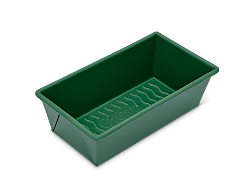 Close-up of the Great Jones | Breadwinner loaf pan with a corrugated bottom, designed for easy baking and cleaning with a nonstick, nontoxic ceramic coating.