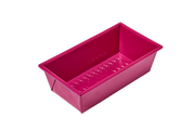 Great Jones | Breadwinner - Raspberry loaf pan with a nonstick, nontoxic ceramic coating and wavy, corrugated bottom for easy release of baked goods.