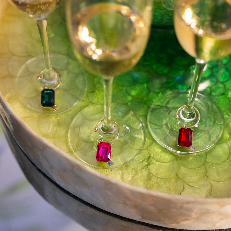 Joanna Buchanan Party Set features wine glasses adorned with elegant gems, perfect for enhancing any gathering with a touch of sophistication.