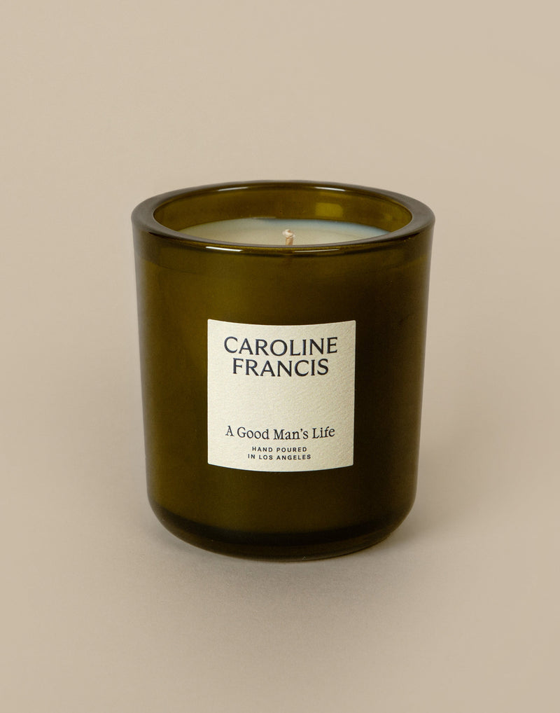 Caroline Francis | A Good Man's Life candle, featuring a glass container and label, made with non-toxic coconut soy wax for sensitive users.