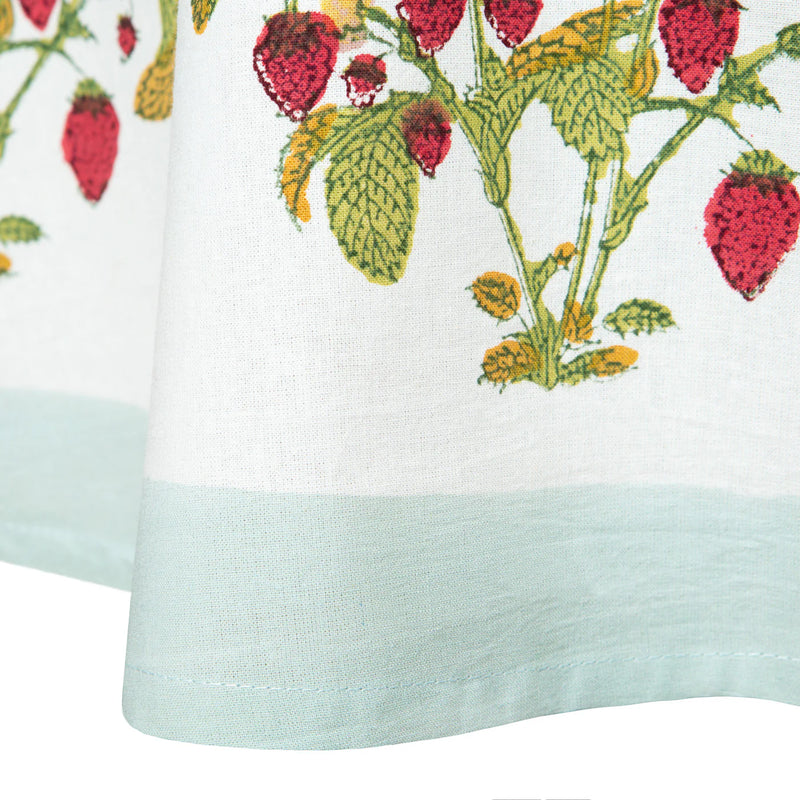 Caravan Home | 71 x 106 Fraises des Bois Blue Tablecloth featuring intricate handprinted floral embroidery, showcasing exquisite craftsmanship for dining elegance.