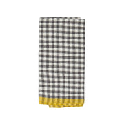 Caravan Home | 20 x 30 Gingham Grey & Dijon Towels: A folded tea towel with a black-and-white checkered pattern and a yellow border, ideal for a sunny kitchen.