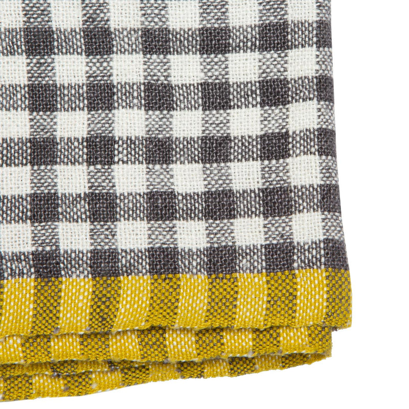 Caravan Home | 20 x 30 Gingham Grey & Dijon Towels featuring a black-and-white checked pattern with a distinctive yellow-striped border, perfect for any kitchen setting.