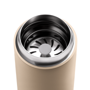 FELLOW | Carter Move Mug, Sand Dune / 16 oz, showcasing stainless-steel interior and removable strainer, ideal for maintaining beverage temperature while commuting.
