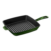 Staub Cast Iron Square Grill Pan, ideal for indoor grilling with authentic grill marks and efficient fat drainage, showcased against a simple background.