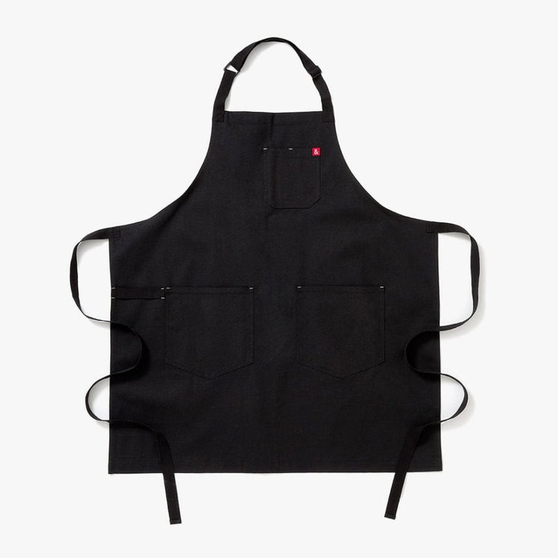 Hedley & Bennett | Essential Aprons - Caviar features adjustable straps and pockets, crafted from durable cotton canvas, ideal for versatile cooking at Athens Cooks.