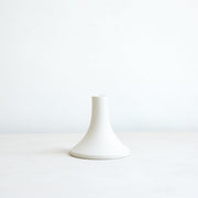The Floral Society | Candle Holders, Grand, Matte White Tall: A minimalist, matte-finished ceramic piece with a flared base, perfect for standard taper candles.