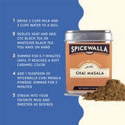 Spicewalla Chai Masala tin with powder, next to a recipe card for making chai, emphasizing Indian street flavors with ginger and cardamom.