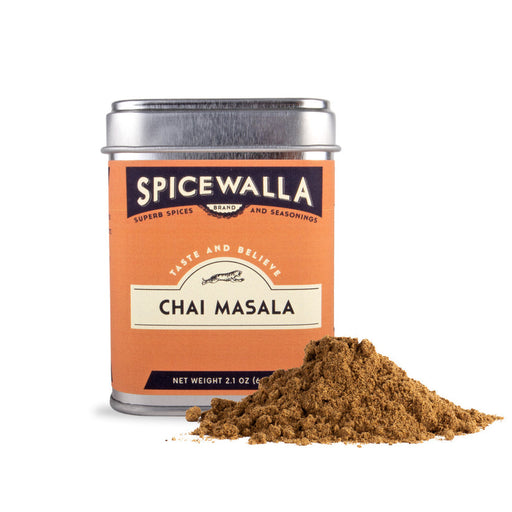 Spicewalla | Chai Masala tin with a mound of spiced tea blend, inspired by Indian street flavors, ideal for brewing chai or enhancing desserts.