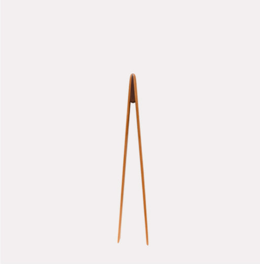 Jonathan's Spoons | Children's Chopsticks: Wooden kitchen tongs with two slender arms joined by a bridge, ideal for cooking or serving, showcased upright.