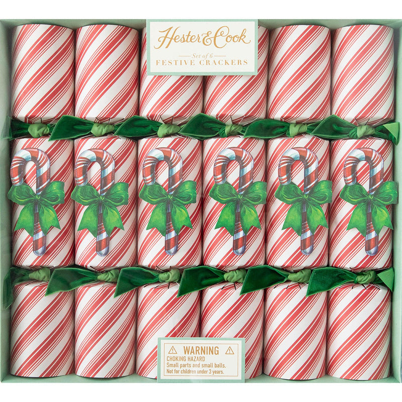 Hester & Cook | Christmas Crackers - Candy Cane, featuring surprises like honeycomb balls, confetti, gold crowns, and conversation cards, perfect for festive dining and celebrations.