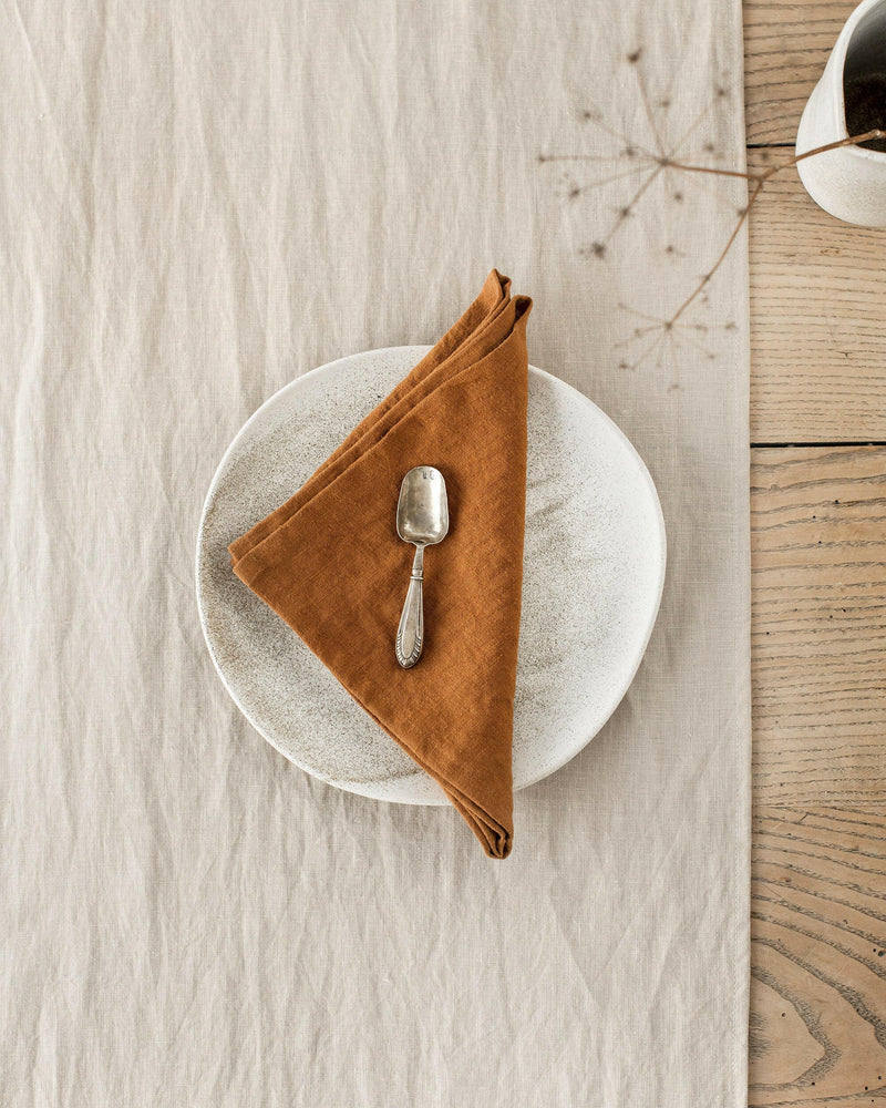 MagicLinen Linen Napkins in Cinnamon Gingham, Set of 2, showcasing elegant, soft linen with a stone-washed texture for a refined dining experience.