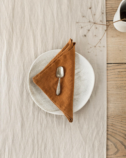 MagicLinen Linen Napkins in Cinnamon Gingham, Set of 2, showcasing elegant, soft linen with a stone-washed texture for a refined dining experience.