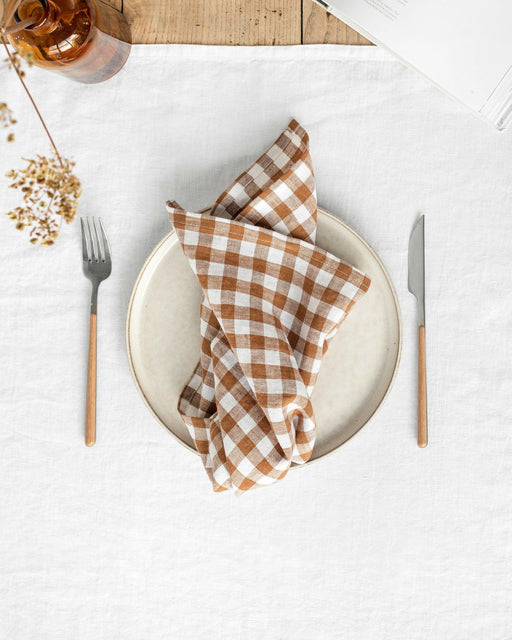 MagicLinen Linen Napkins - Cinnamon Gingham, Set of 2, featuring stone-washed texture for softness and durability, perfect for mixing with table accessories.