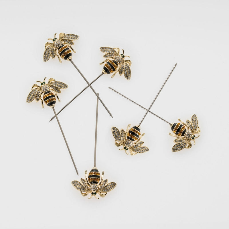 Joanna Buchanan | Cocktail Picks - Bee features whimsical bee designs on stainless steel picks, perfect for garnishing drinks or appetizers, beautifully boxed for gifting.