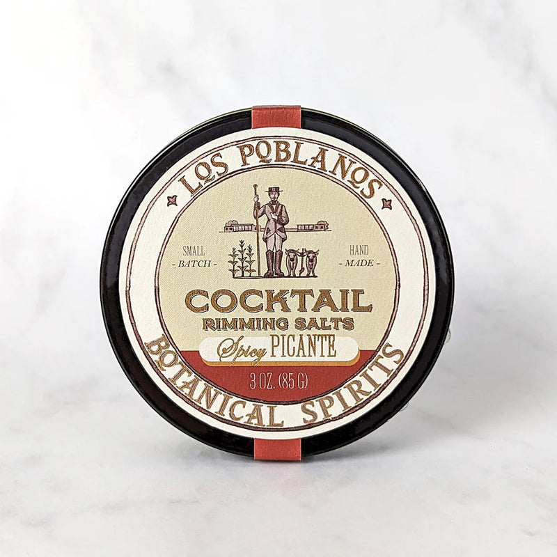 Los Poblanos Cocktail Rimming Salt - Spicy, displayed in a sleek jar, ideal for enhancing cocktail flavors. Perfect for culinary enthusiasts seeking unique barware additions.