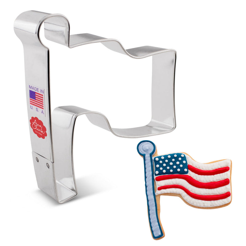 Ann Clark | Cookie Cutters - Flag; a cookie cutter shaped like a flag, alongside a decorated flag cookie, ideal for patriotic baking projects.