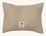 Coral & Tusk | Blackbird with Acorn Pillow: A natural-tone linen pillow featuring an embroidered blackbird with an acorn, symbolizing new beginnings.