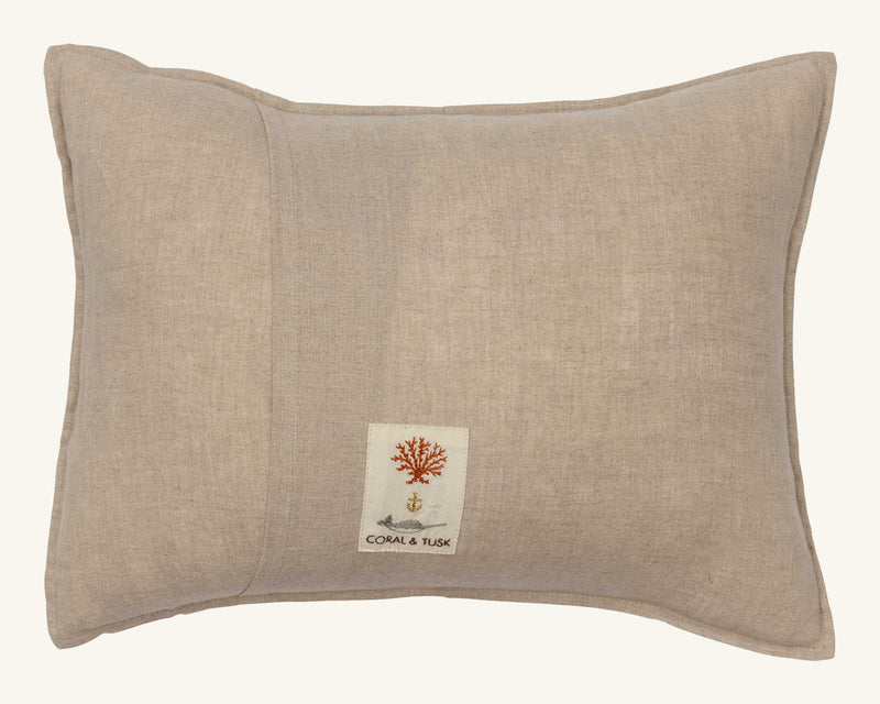 Coral & Tusk | Blackbird with Acorn Pillow: A natural-tone linen pillow featuring an embroidered blackbird with an acorn, symbolizing new beginnings.