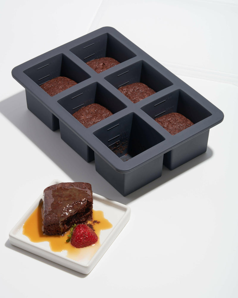 W&P Cup Cube Silicone Food Storage Meal Prep - 6 Cube - Charcoal, featuring six marked silicone compartments with a BPA-free lid, ideal for freezing and reheating portions.