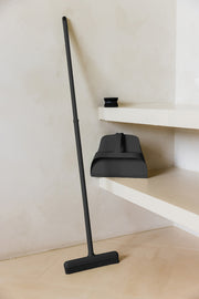 Dotti | Best Broom & Dustpan Odyssey displayed on a white shelf, featuring sleek design and ergonomic functionality, ideal for modern kitchens.