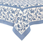 Caravan Home | 59 x 86 Granada Cornflower Blue Tablecloth featuring a hand-printed floral pattern with cornflower blue pomegranates, suitable for various dining occasions.