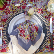 Caravan Home 59 x 86 Red & Grey Tablecloth set with silverware and floral design, inspired by Southern France gardens, handprinted by artisans.