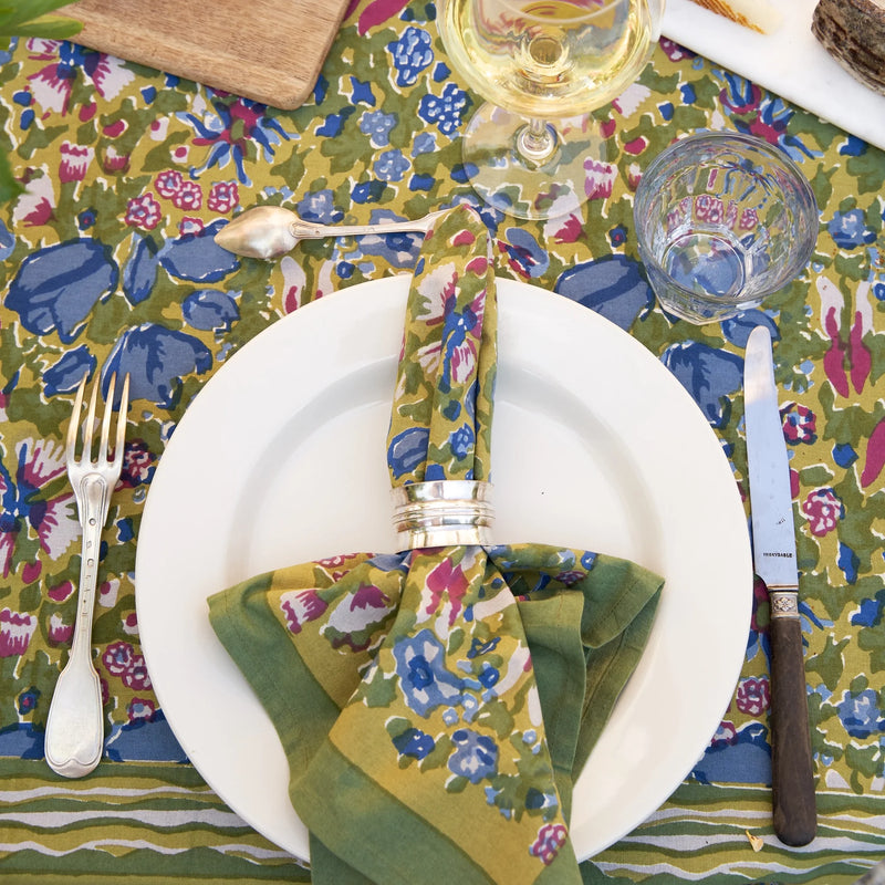 Caravan Home | 19 x 19 Jardin Blue & Vert Napkins Set of 6 arranged elegantly with tableware, enhancing dining experiences with French-inspired design from Athens Cooks.