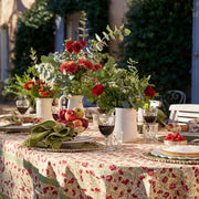 Caravan Home | 21 x 21 Avocado Everyday Napkin Set of 4, elegantly displayed on a table with fruits and a floral centerpiece.