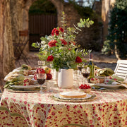 Caravan Home | 21 x 21 Avocado Everyday Napkin Set of 4 displayed on a dinner table with elegant tableware and floral centerpiece.