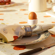 Caravan Home | 19 x 19 Springfields Multi Napkins Set of 6 on a plate, showcasing fine French linens with floral patterns, perfect for elevating dining experiences.