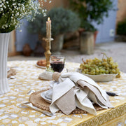 Caravan Home | 21 x 21 Stone Everyday Napkins Set of 4 elegantly arranged on a table with grapes, enhancing a sophisticated dining experience.