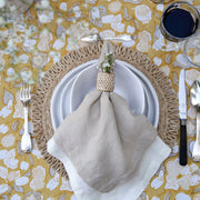 Caravan Home | 21 x 21 Stone Everyday Napkins Set of 4, elegantly folded on a table setting with glassware, enhancing dining sophistication.