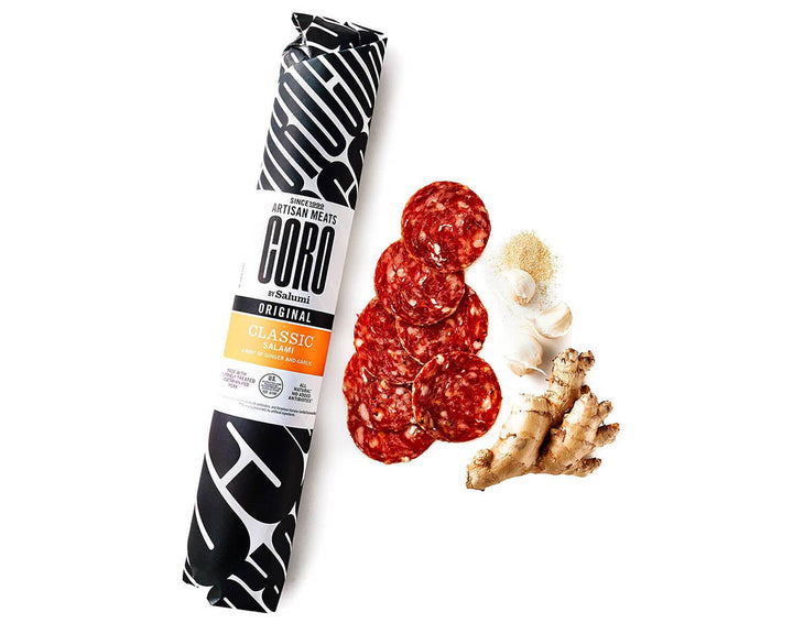 Coro | Deli Sticks - Classic 2 lb, close-up of a salami tube, showcasing artisan craftsmanship with rich garlic and ginger notes for charcuterie or snacking.