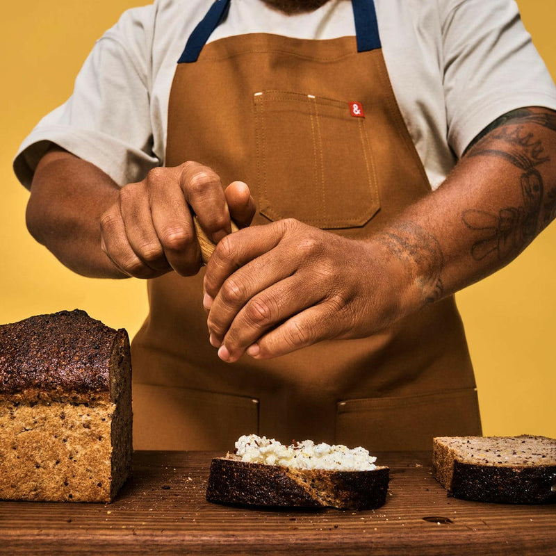 Hedley & Bennett | Essential Aprons - Tahoe Pine offers a stylish, practical apron with adjustable straps and pockets, made of durable, stain-resistant cotton canvas.