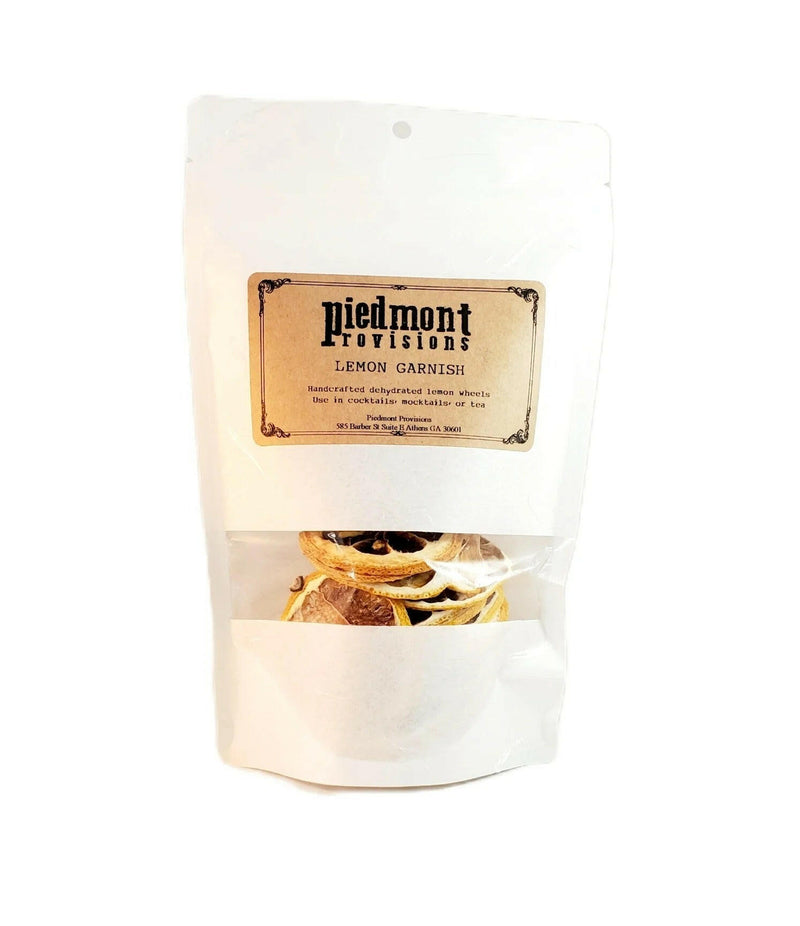 Piedmont Provisions | Dried Fruit Cocktail Garnishes - Lime: A bag of dehydrated lime slices, perfect for enhancing cocktails and culinary creations, from Athens Cooks' specialty food collection.
