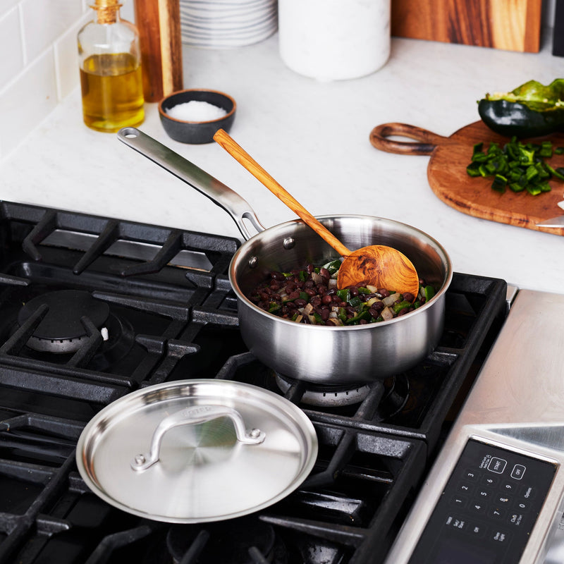 Heritage Steel | Titanium Series Mini Sauté with Lid on a stove, showcasing its premium durability and versatility for cooking.
