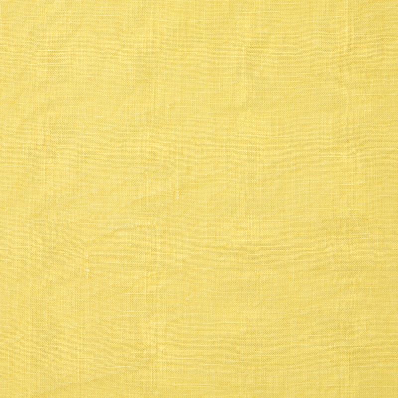 Caravan Home | 21 x 21 Citrus Everyday Napkin Set of 4, featuring yellow linen with subtle patterns, hand-dyed, pre-washed, and tailored with mitered corners.