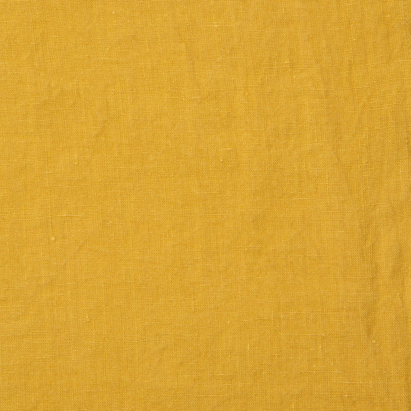 Caravan Home | 21 x 21 Dijon Everyday Napkins Set of 4, showcasing close-up of yellow patterned fabric with refined tailoring and natural texture.
