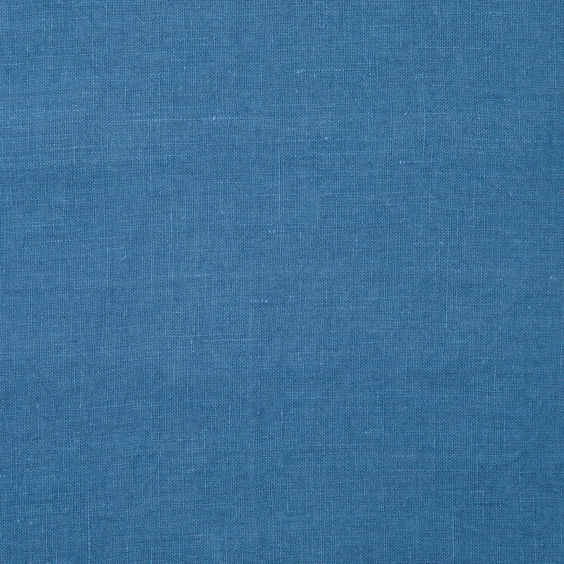 Caravan Home 21 x 21 Lake Everyday Napkins Set of 4, featuring a blue fabric with a wavy pattern, tailor-finished with mitered corners for sophistication.