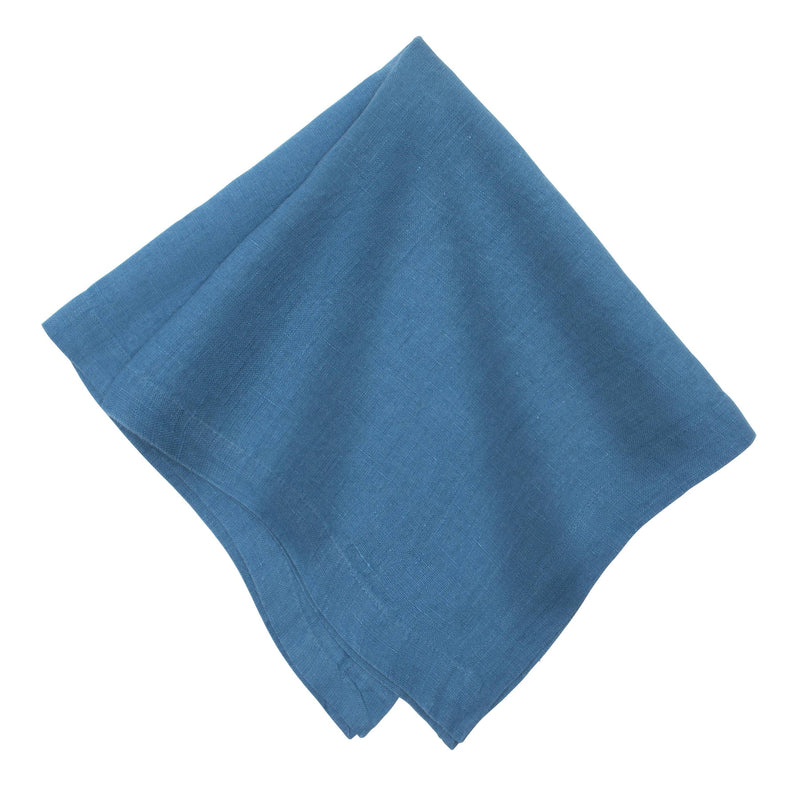 Caravan Home 21 x 21 Lake Everyday Napkins Set of 4, showcasing a folded blue napkin highlighting its craftsmanship and soft linen texture.