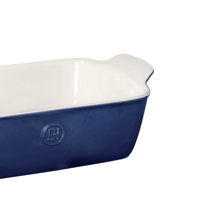 Emile Henry | Modern Classics Loaf Pan, Rouge, 9 x 5, glossy white interior, deep blue exterior, molded handles, perfect for baking beautifully golden loaves.
