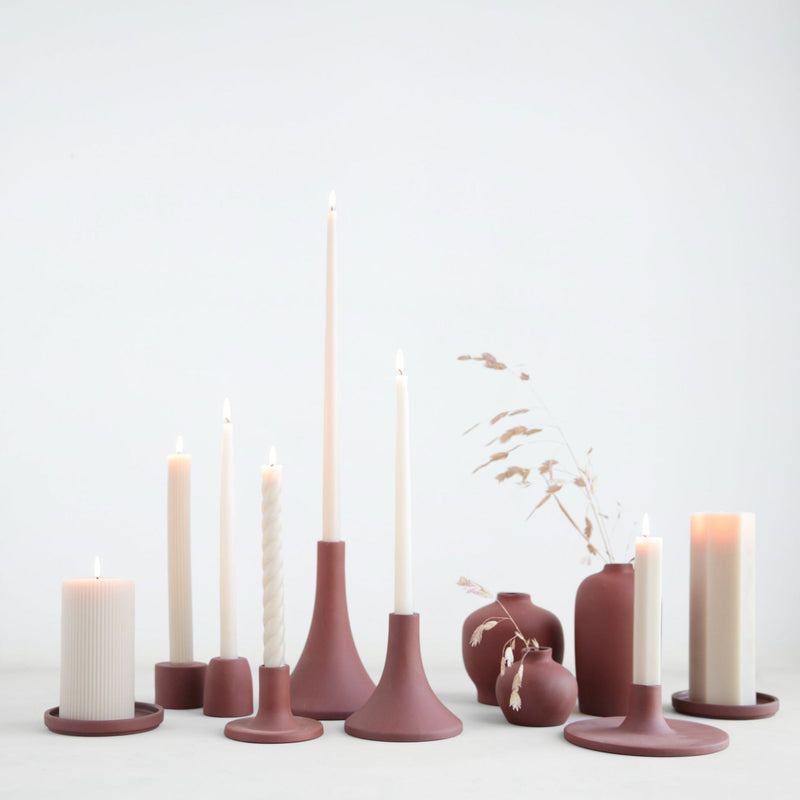 The Floral Society | Daily Plate, Sand, displayed with terracotta candle holders and clay vases, showcasing its versatile, modern design ideal for candles or as a decorative piece.