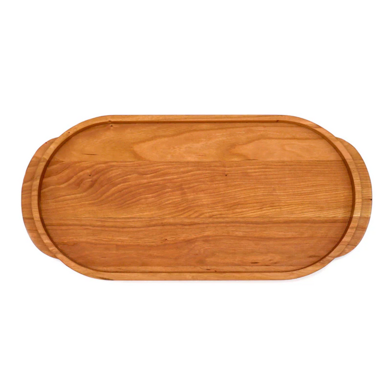 J.K. Adams | Cherry Oval Wooden Serving Tray with shallow handles and juice-catching groove, ideal for serving drinks or creating charcuterie boards.