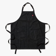 Hedley & Bennett's Essential Apron in Abalone Black Denim, featuring adjustable straps and multiple pockets, ideal for both casual and sophisticated cooking endeavors.